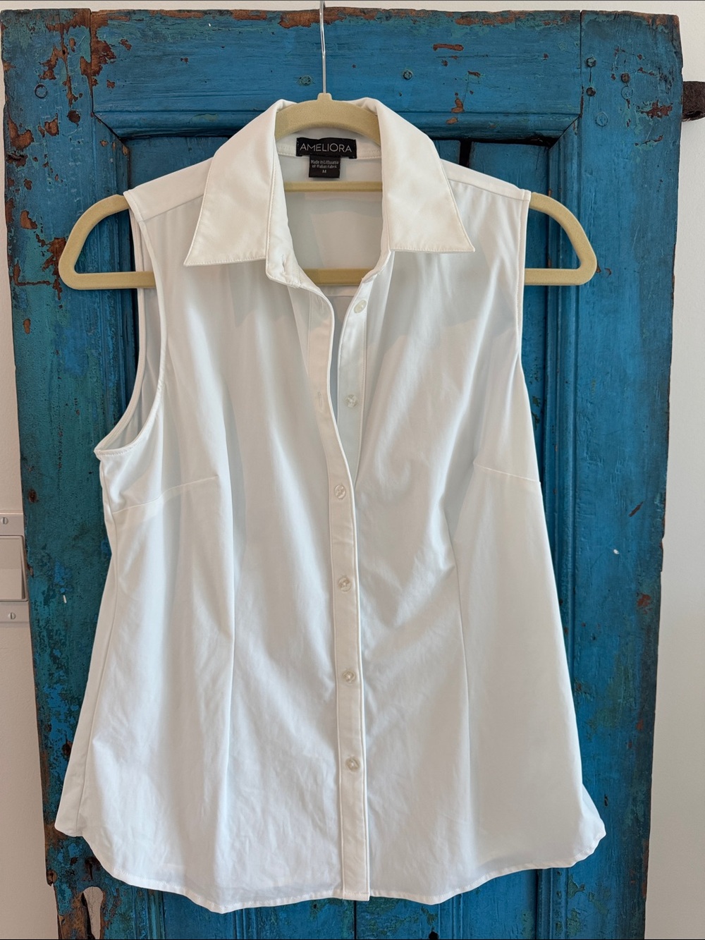 Ameliora (Italian Fabric) White Sleeveless Button-Front Shirt